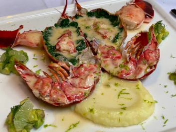 Fleurie Restaurant signature dishes Poached Lobster Tail
Dry-Aged Duck Breast
Filet Mignon And Beet Agro Dulce